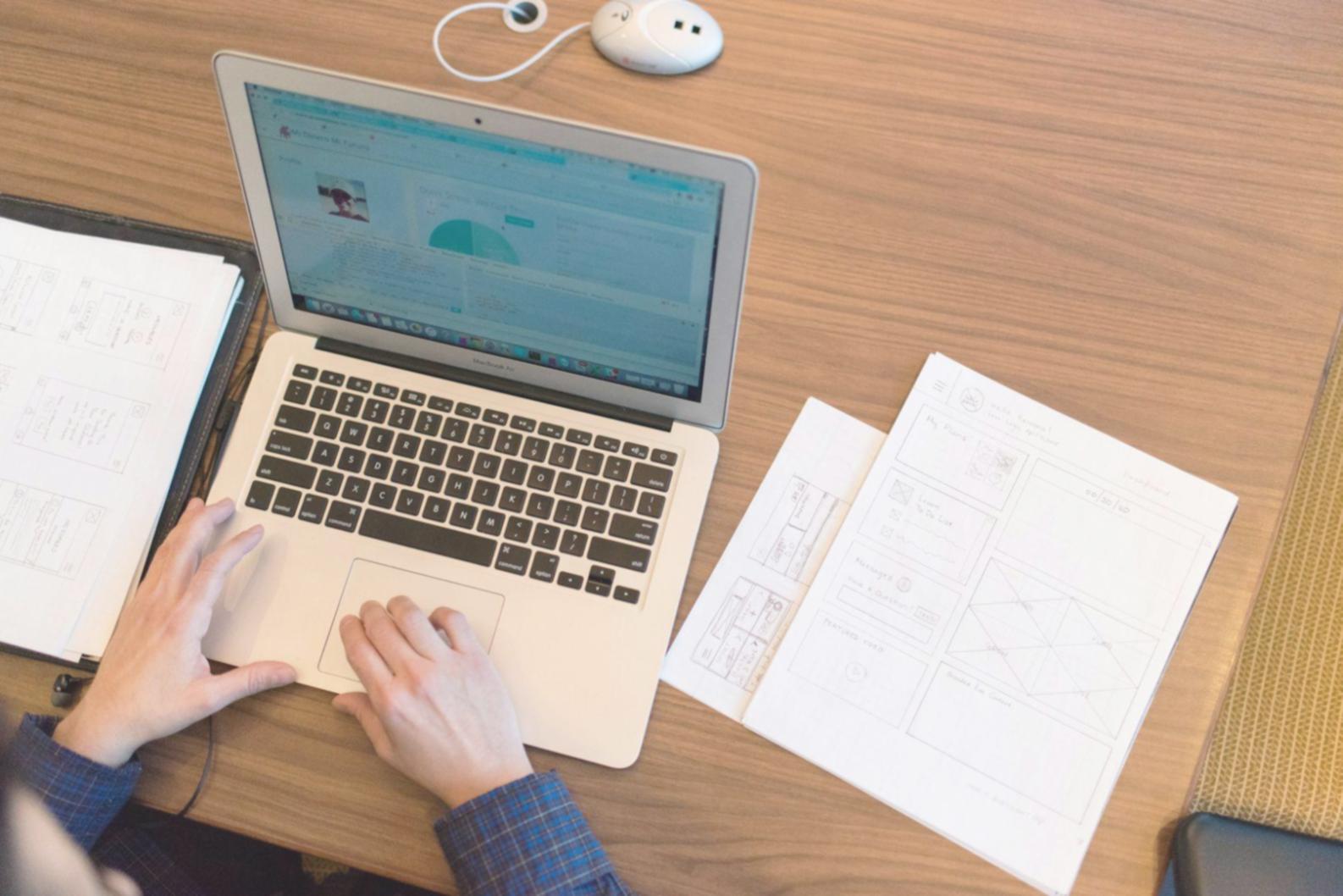 Business professional analyzing solvency metrics and debt ratios using financial software